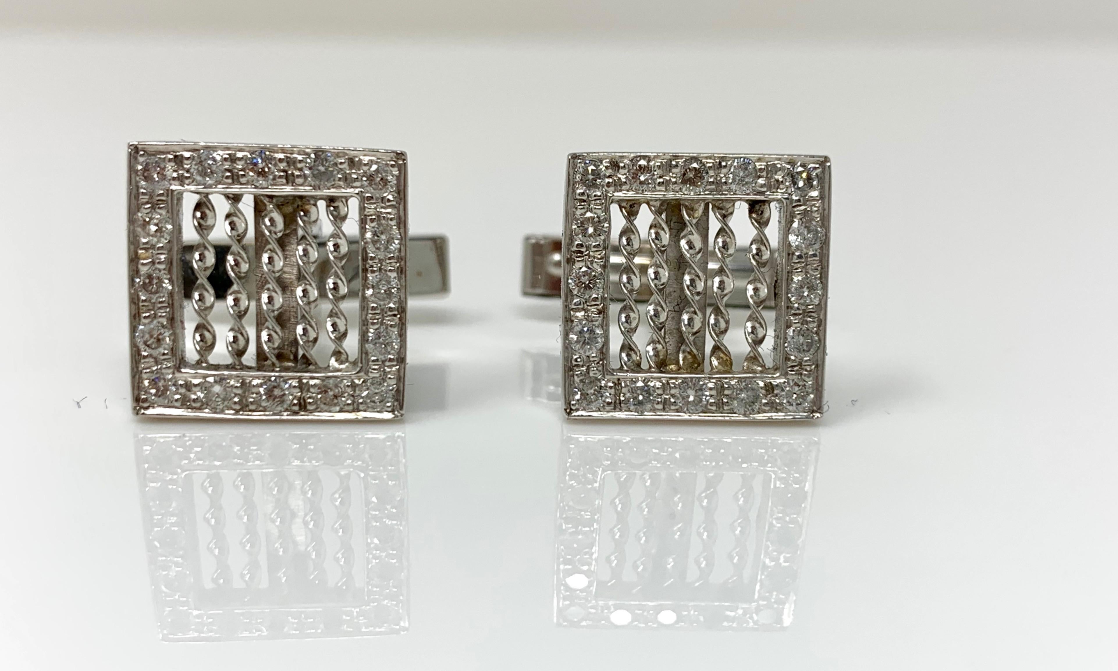 These attractive white gold and diamond cufflinks are handcrafted in 14 k white gold. 
Diamond weight : 1 carat ( GH color and VS clarity ) 
Metal :  14k white gold 
Measurements : 1/2 inch by 1/2 inch 