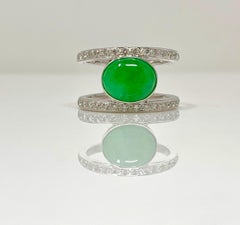 GIA Certified Green Jadeite Jade Oval Cabochon And Diamond Ring In 18 K Gold.