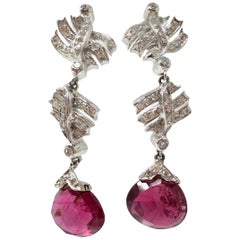 White Round Brilliant Diamond and Rubelite Dangle Earrings in 18 Karat Gold