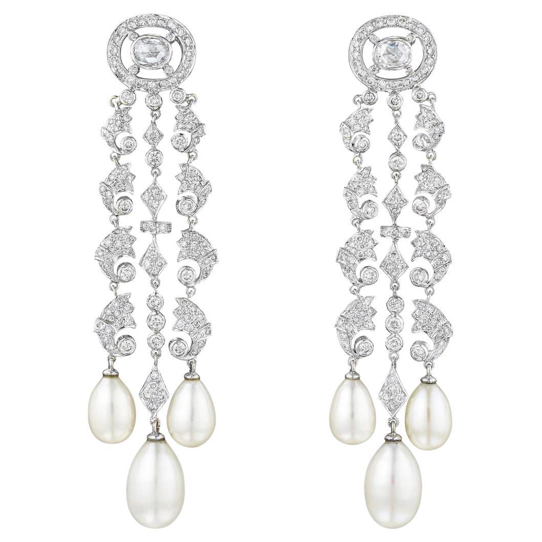 White Round Brilliant Diamond And White South Sea Pearl Earrings In 18k Gold.