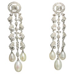 White Round Brilliant Diamond And White South Sea Pearl Earrings In 18k Gold. White Round Brilliant Diamond And White South Sea Pearl Earrings In 18k Gold.
