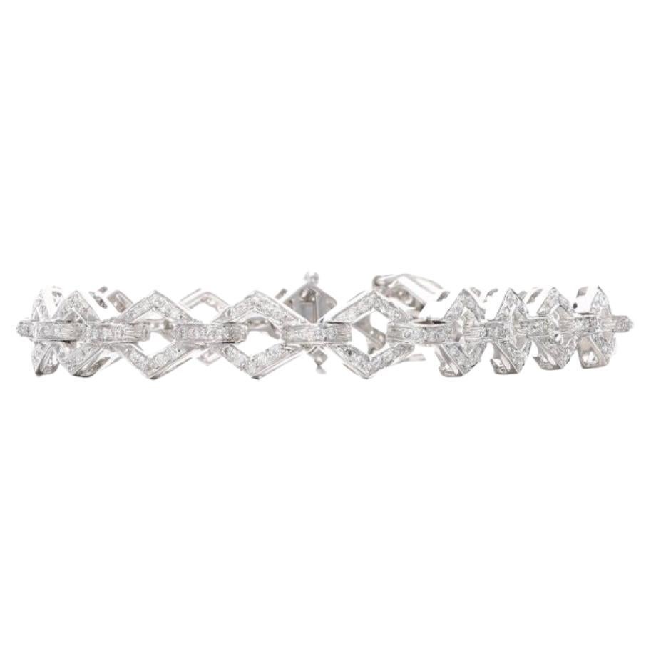 Classic and Elegant white round brilliant diamond bracelet! This beautiful and flexible diamond bracelet is designed by Moguldiam Inc and hand crafted in 18 k white gold. The diamond weight is 1.76 carat with GH color and VS clarity and gold weight