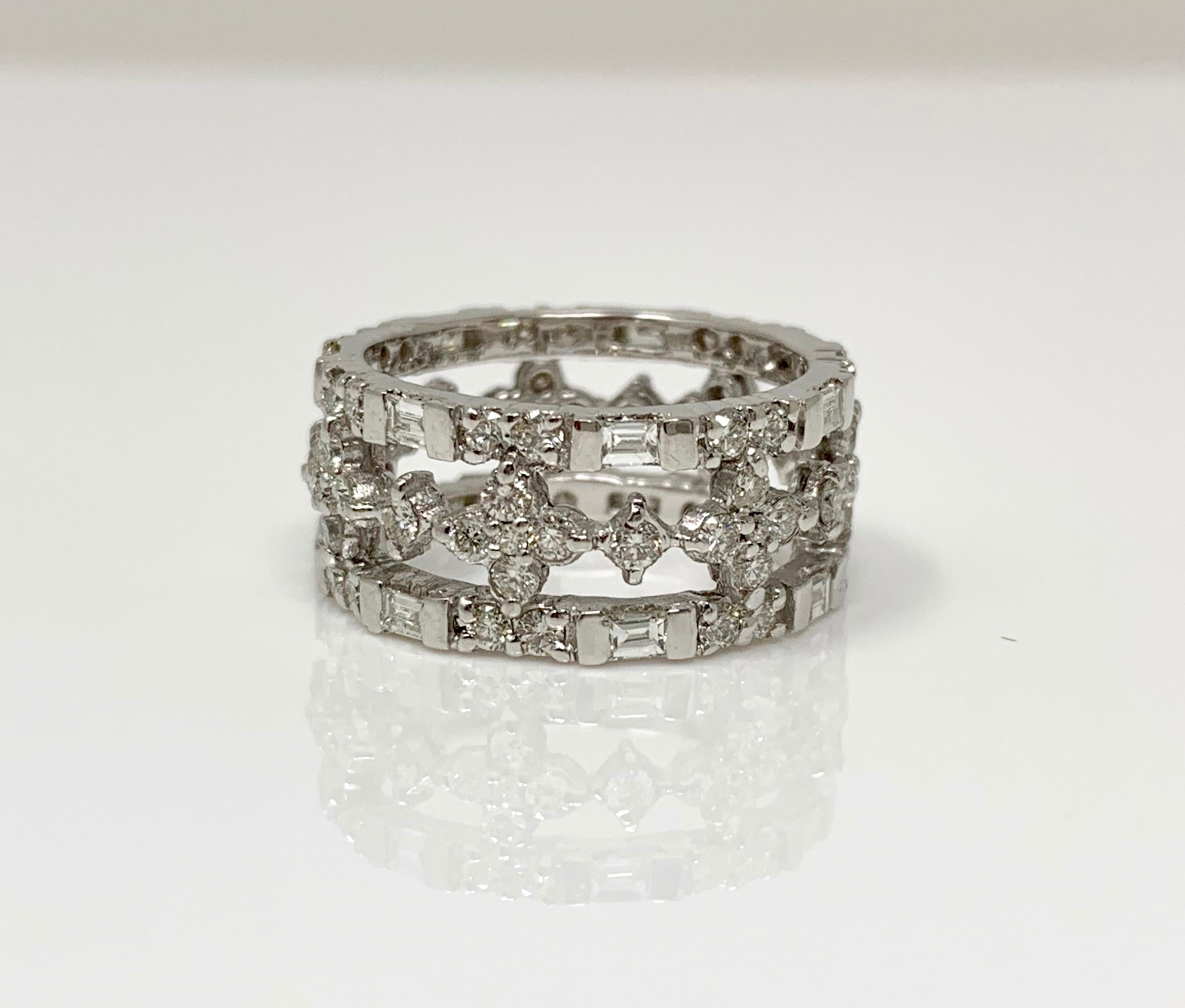 Looking for a unique white diamond eternity band? Look no further! This beautiful eternity band is hand crafted in 18k white gold and the diamond weight is 2 carat  approx with VS clarity and GH color. The ring size is 6. 