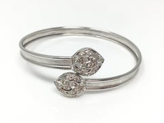 White Round Brilliant Diamond Flexible Bangle in 18 Karat White Gold