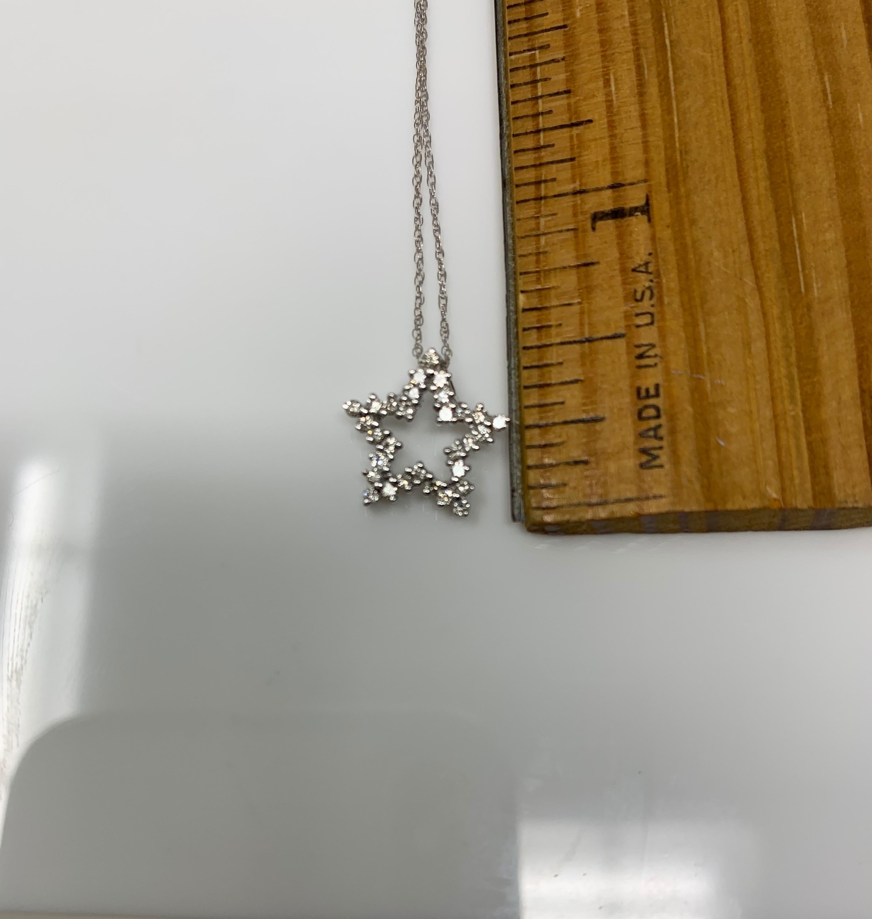 Contemporary White Round Brilliant Diamond Star Pendant For Sale