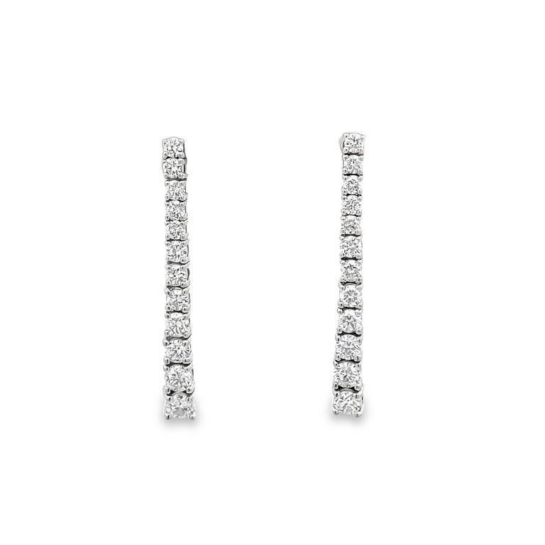 This earring is designed for women who want to be fashionable on any occasion. It is a pair of earrings made of 14K white gold with fourteen diamonds of 0.50 pointer each with a total of 7.52-carat weight. This design is modern and fashionable and