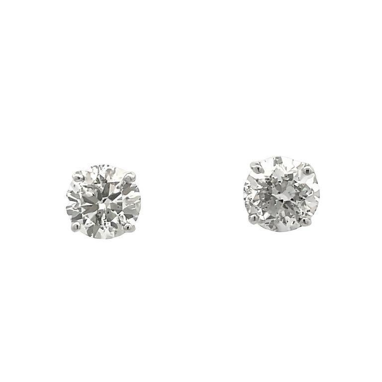 We're thrilled to introduce our stunning white round diamond earrings, an excellent addition to your everyday jewelry collection. Our collection features exceptional, natural diamonds in H color and SI1-SI2 clarity, weighing 3.03 carats, carefully