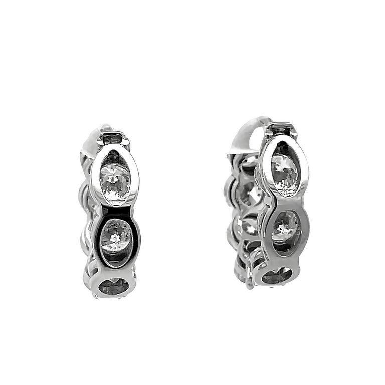 Modern White Round Diamond 7.18 CT in 18K White Gold Eternity Hoops Earrings  For Sale