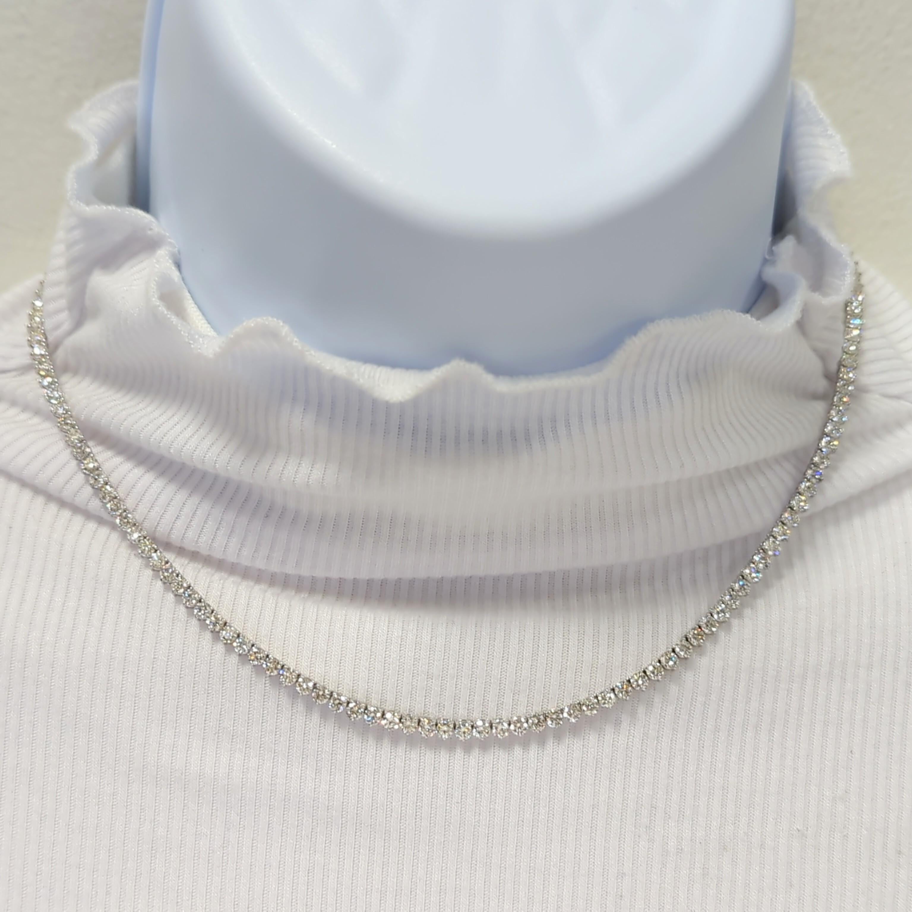 Beautiful 8.40 ct. good quality, white, and bright diamond rounds.  Handmade in 14k white gold.  Length is 16