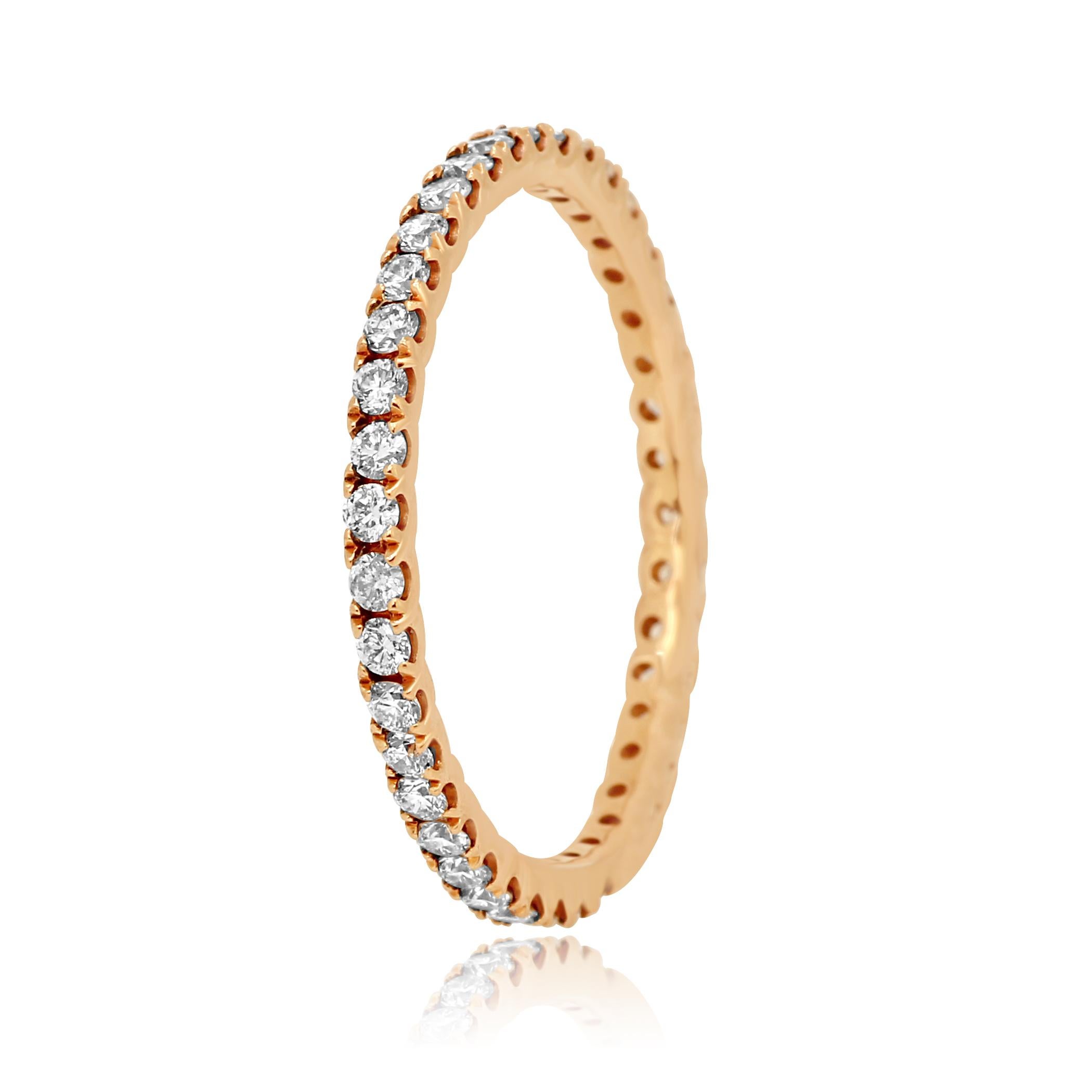 White Diamond Rounds 0.56 Carat set in 14K  Rose Gold Eternity Band Ring.

Total Diamond Weight 0.56 Carat

Can be Customized for different Ring Size as well as Different Gold Color.