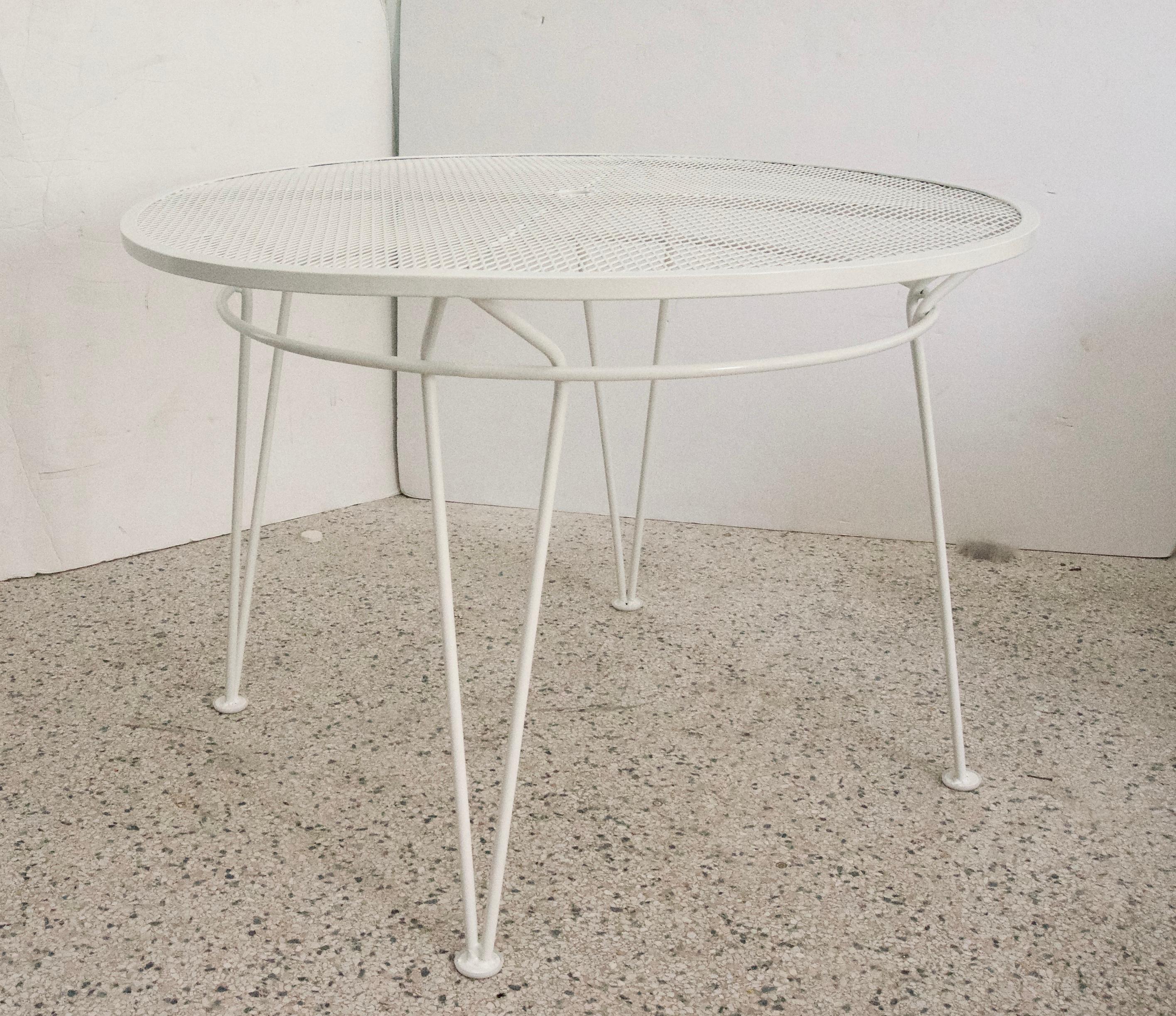 This piece has been professionally restored and powder-coated in Palm Beach White.

We also have two settees, armchairand a small side table in the some pattern and color for sale.

Note: Opening for umbrella is 1.50