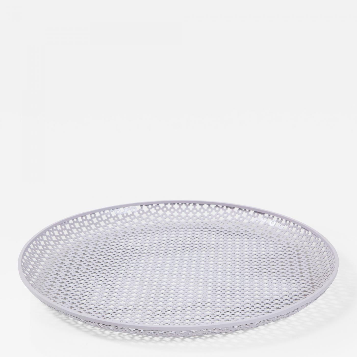 Exquisite white round perforated metal tray by Mathieu Matégot, France, circa 1950s.

