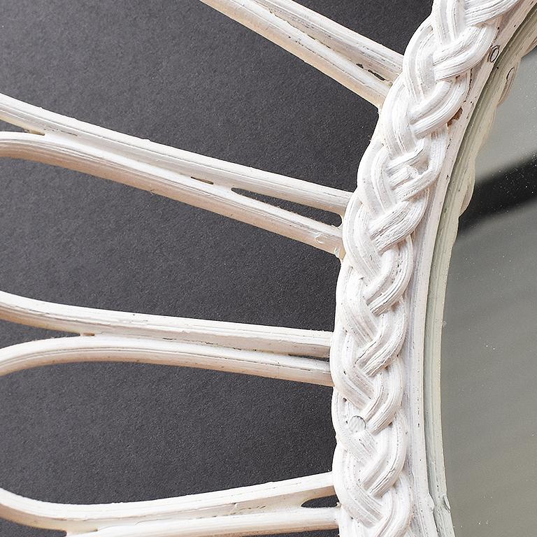 How we would style it:


Square exterior rattan or wicker mirror in the style of Franco Albini. The exterior shape of the mirror is square with soft rounded edges. The mirror however is round. Framed in lovely bentwood rattan. Gentle loops