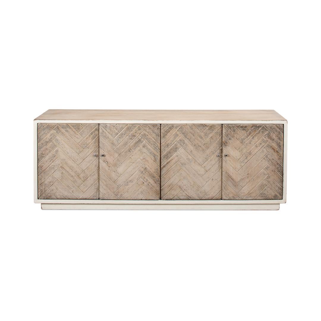 Eleva la tua casa con un mix perfetto di forma e funzionalità. Questa credenza vanta un intramontabile motivo a spina di pesce chevron, che aggiunge un tocco di raffinatezza artigianale al tuo spazio. Grazie all'ampio spazio di archiviazione dietro