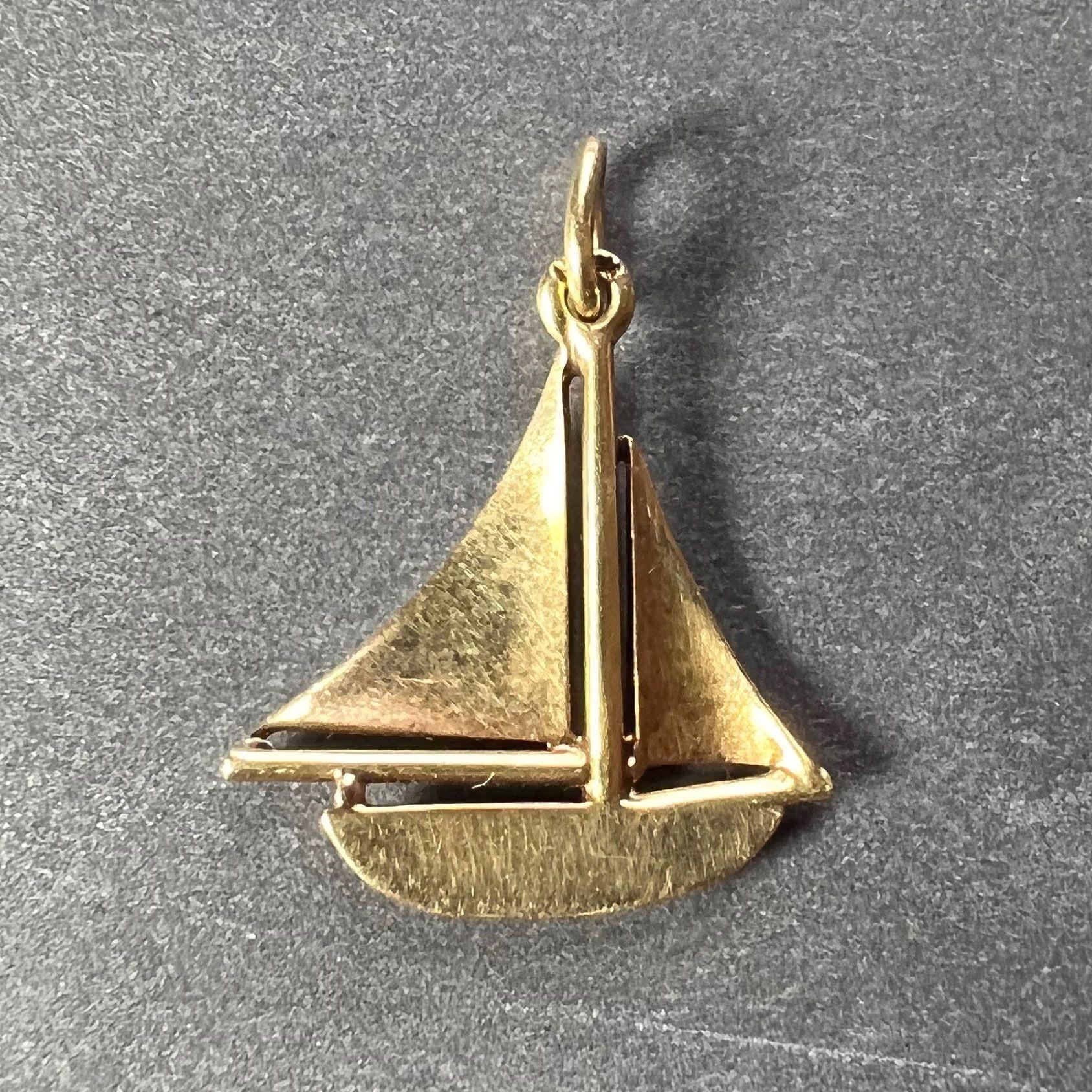 gold sailboat pendant