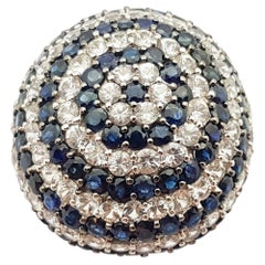 Ring mit weißem Saphir und blauem Saphir in Silberfassung