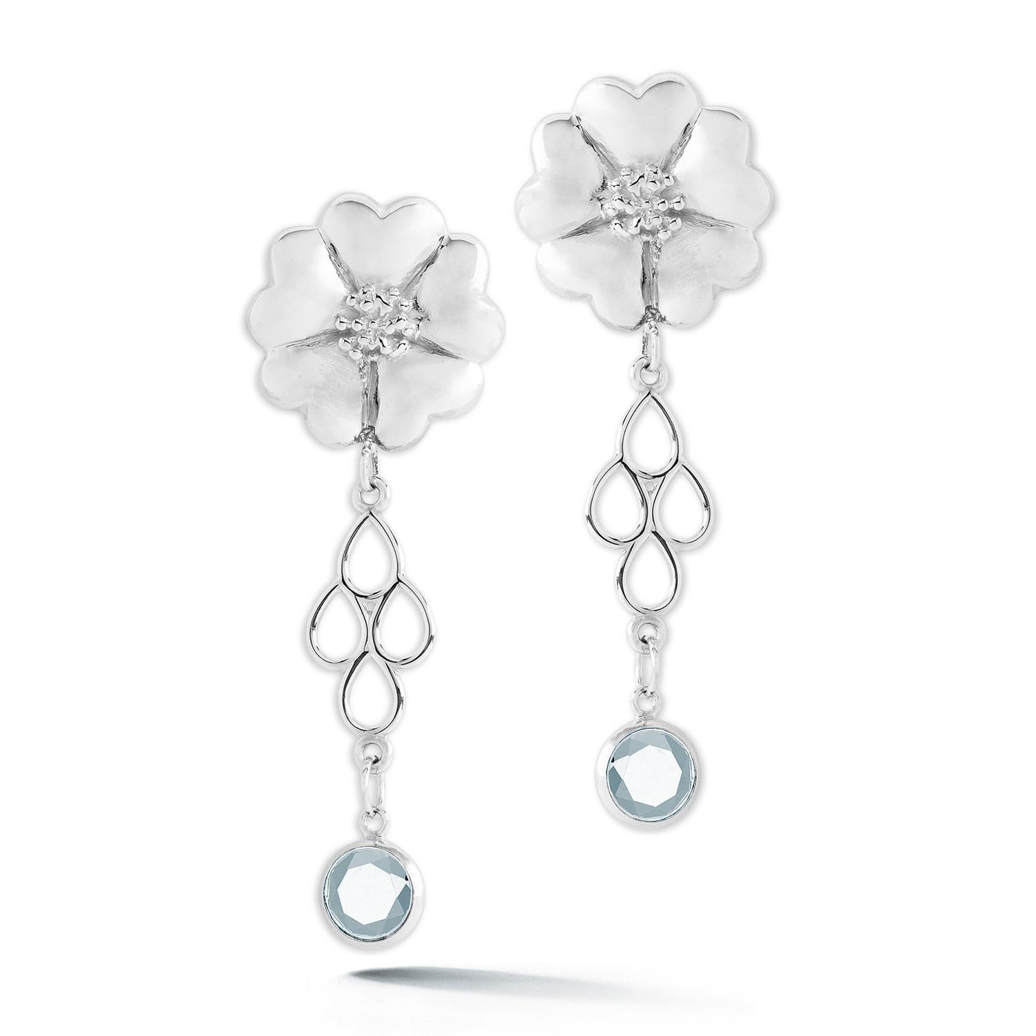 Designed in NYC

.925 Sterling Silver 2 x 6 mm White Topaz Blossom Stone Chandelier Earrings. No matter the season, allow natural beauty to surround you wherever you go. Blossom stone chandelier earrings: 

	Sterling silver 
	High-polish finish