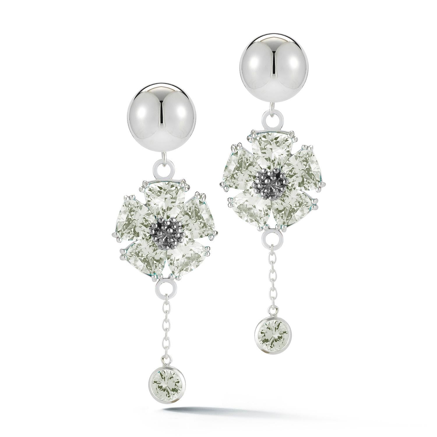 Designed in NYC

.925 Sterling Silver 2 x 20 mm White Sapphire Blossom Stone Bezel Drop Earrings. No matter the season, allow natural beauty to surround you wherever you go. Blossom stone bezel drop earrings:  

    Sterling silver 
    High-polish