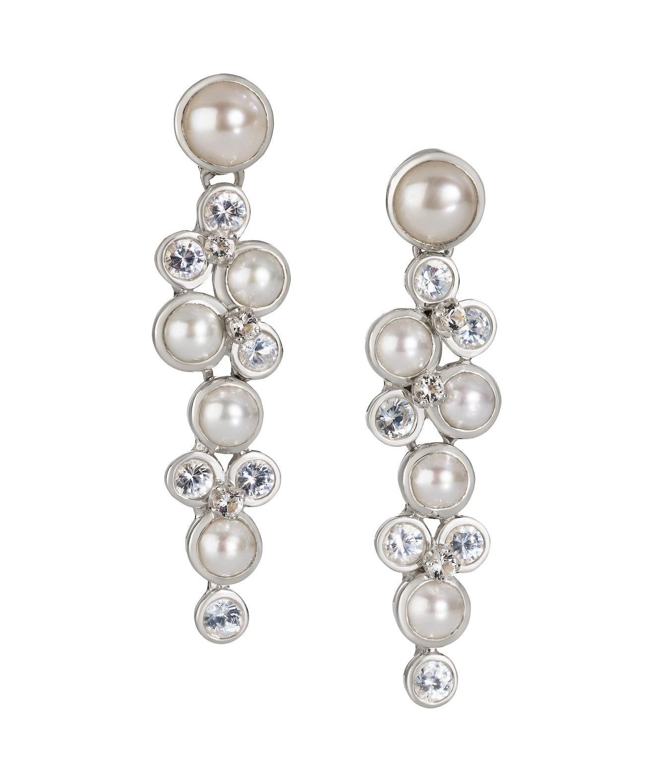 Celebrate every day. Don't keep these earrings in your lock box - these are meant to be worn!!! 
These Constellation earrings are made in 14ky with 1.65 ct of white sapphires. They go with all your outfits. Dress them up or down.  These dangles are