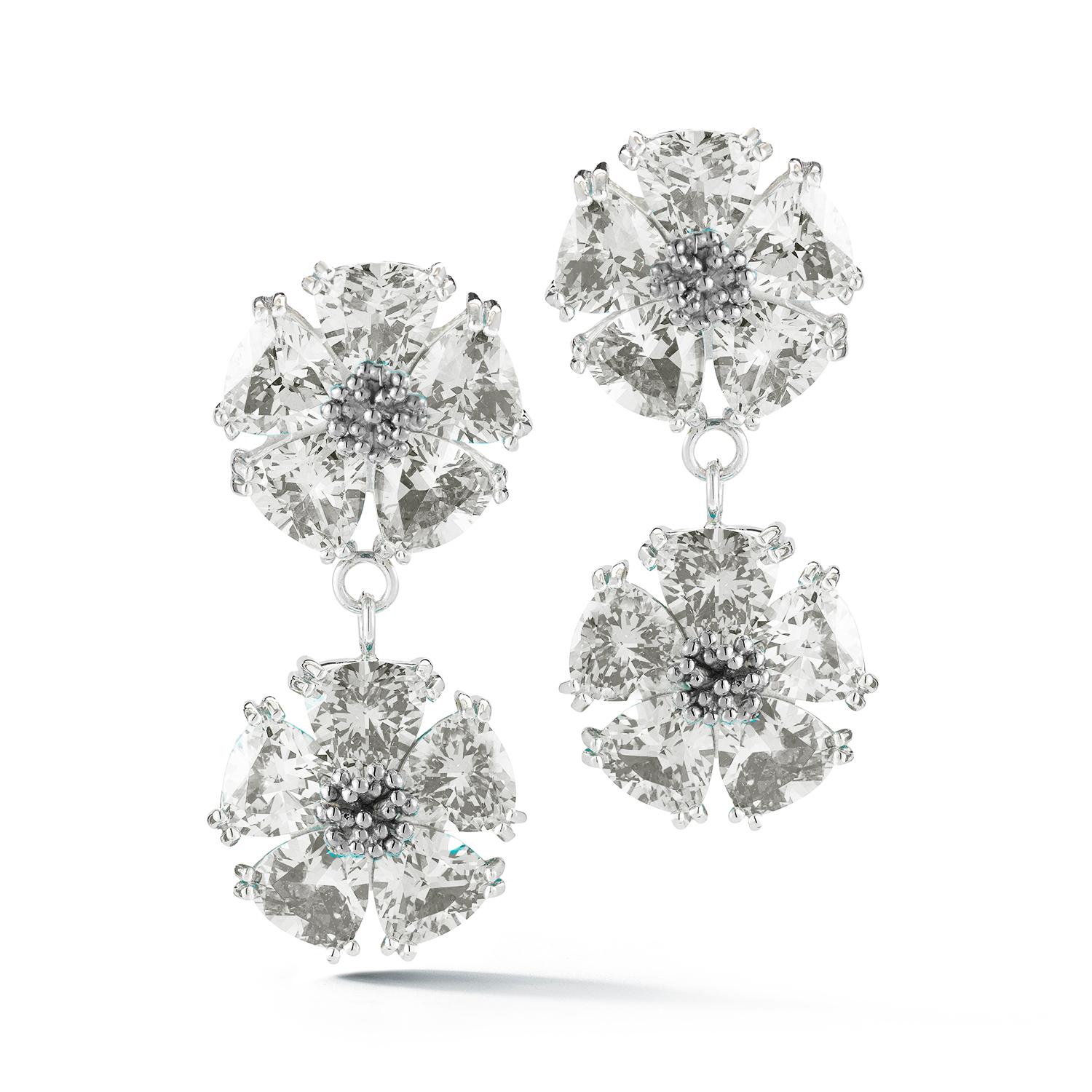 Designed in NYC

.925 Sterling Silver 2 x 20 mm White Topaz Double Blossom Stone Earrings. Double the beauty with double blossom with stone 3D earrings for show-stopping day or night looks. Available in a variety of different gemstone colors (white,