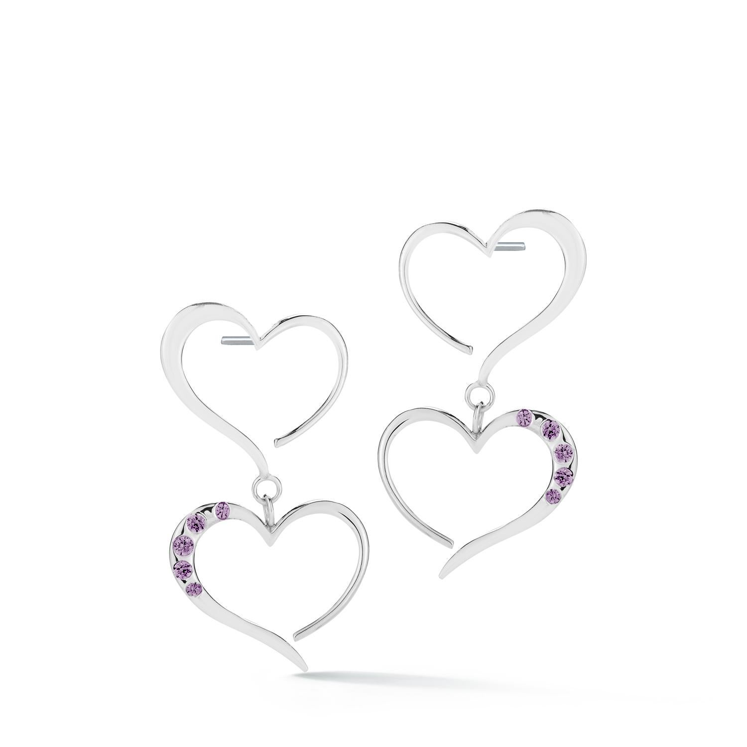 Designed in NYC

.925 Sterling Silver White Topaz Double Heart Pave Dangle Earrings. On the road to charting your own path, the only rule is to follow your heart. Double heart pave dangle earrings:

Sterling silver 
High-polish finish
Light-weight