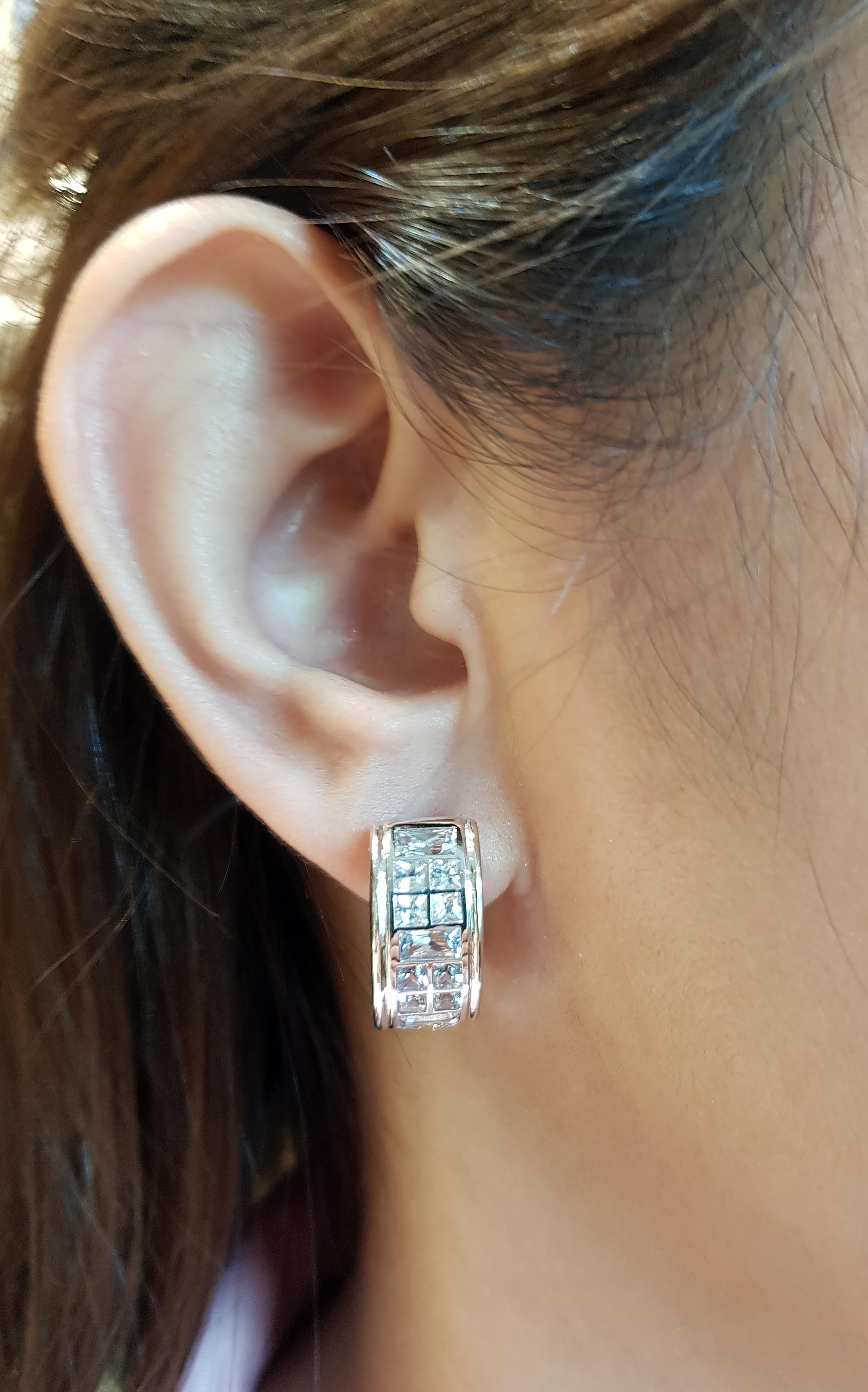 White Sapphire 4.61 carats Earrings set in 18 Karat White Gold Settings

Width:  0.8 cm 
Length: 1.9 cm
Total Weight: 14.44 grams

