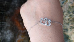 White Sapphire Elephant Bracelet set in Silver Settings