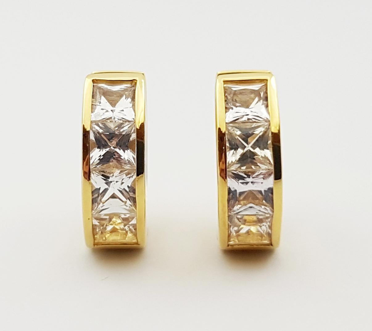 Contemporary White Sapphire Huggies Earrings set in 18 Karat Gold Settings For Sale