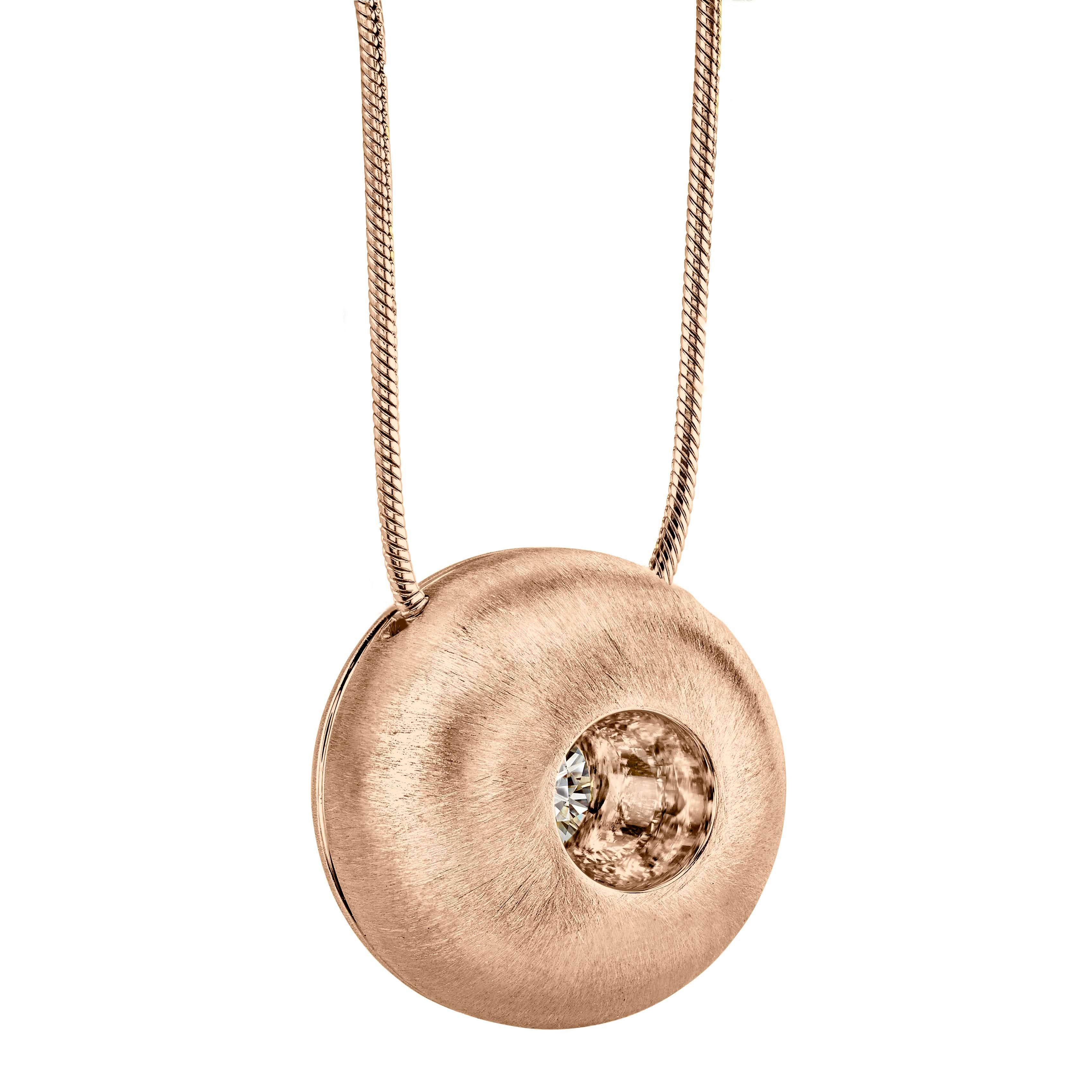 This White Sapphire in Large Rose Gold Dome Pendant, part of our Power Series, is a symbolic design inspired by the idea of looking inward, the notion of what a person needs is already inside of them. The clean and classic lines are imaginative,