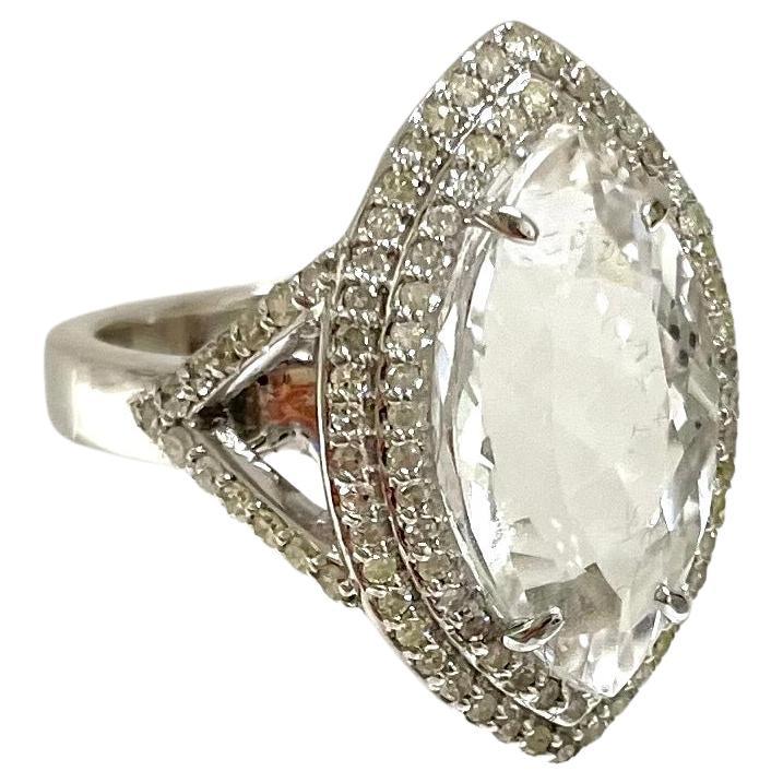 Description
Impressive 7.6 carat white Sapphire marquise is framed with a double step rows of pave diamonds. The ring displays diamond quality for a fraction of the price. Item #R167

Materials and Weight
Sapphire 7.6 carats, 18x9.7x8 mm, marquise
