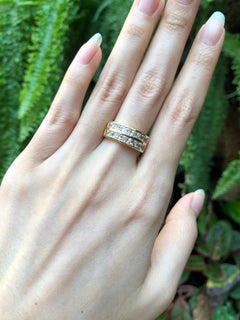 White Sapphire Ring Set in 18 Karat Gold Settings