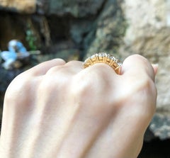 White Sapphire Ring Set in 18 Karat Gold Settings