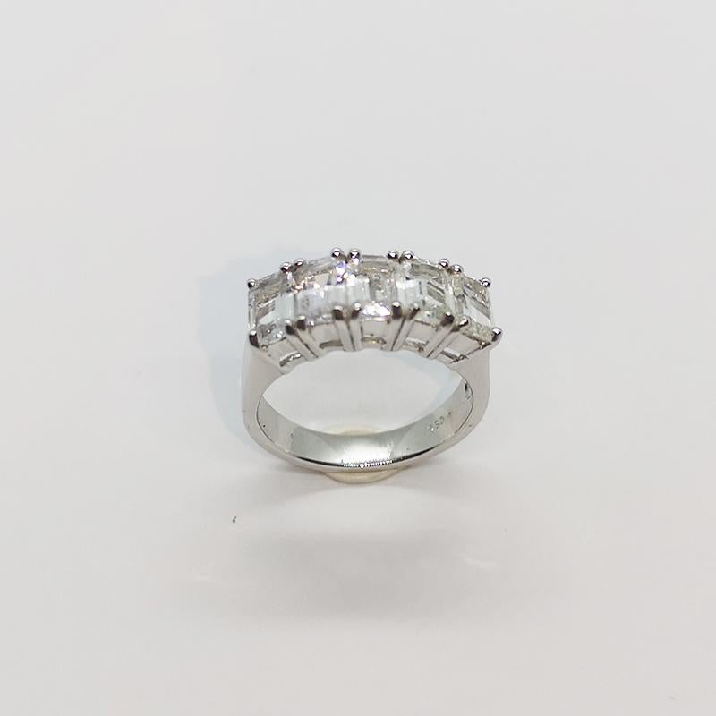 Emerald Cut White Sapphire Ring Set in 18 Karat White Gold Settings