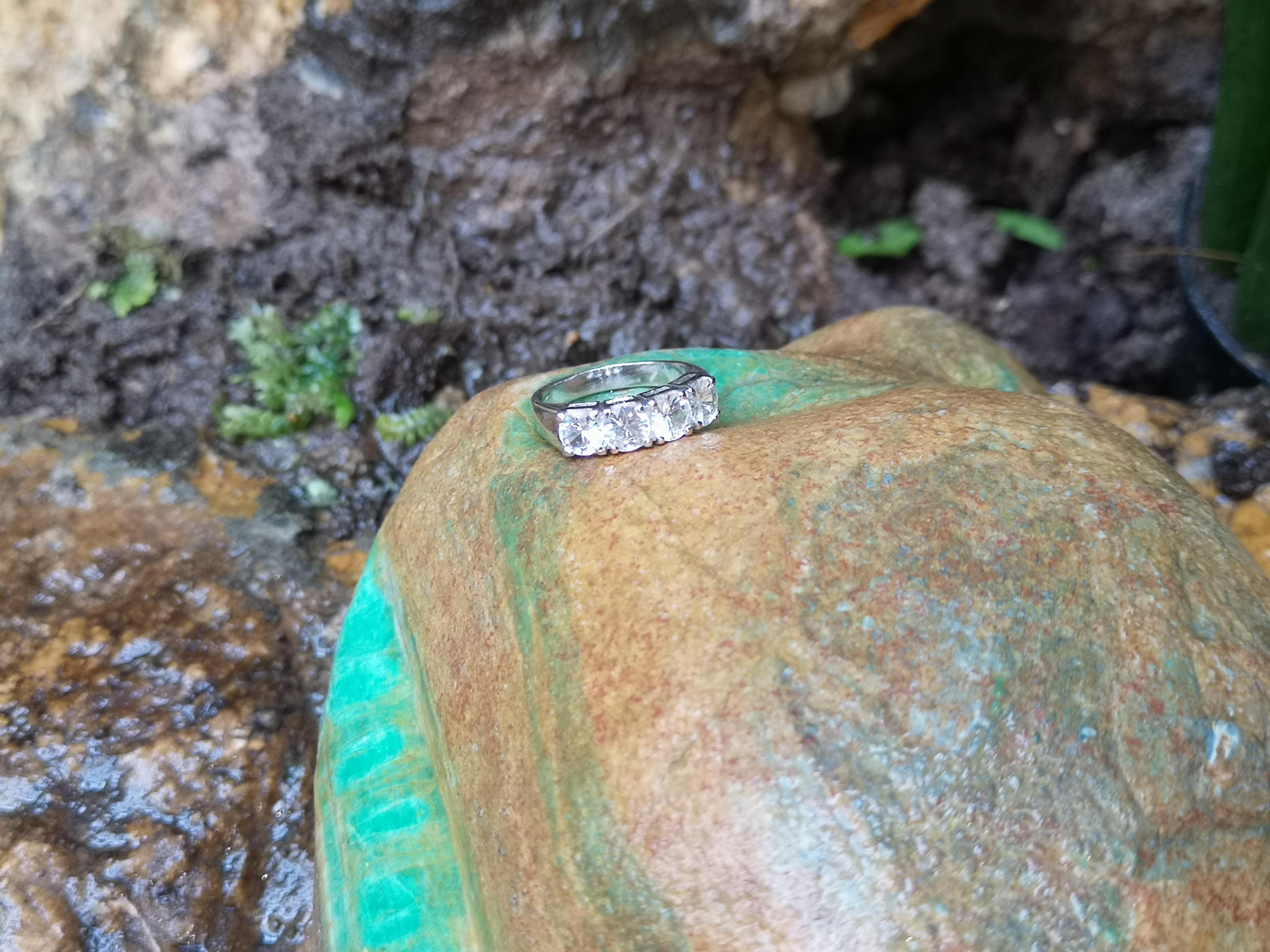 Round Cut White Sapphire Ring Set in 18 Karat White Gold Settings For Sale