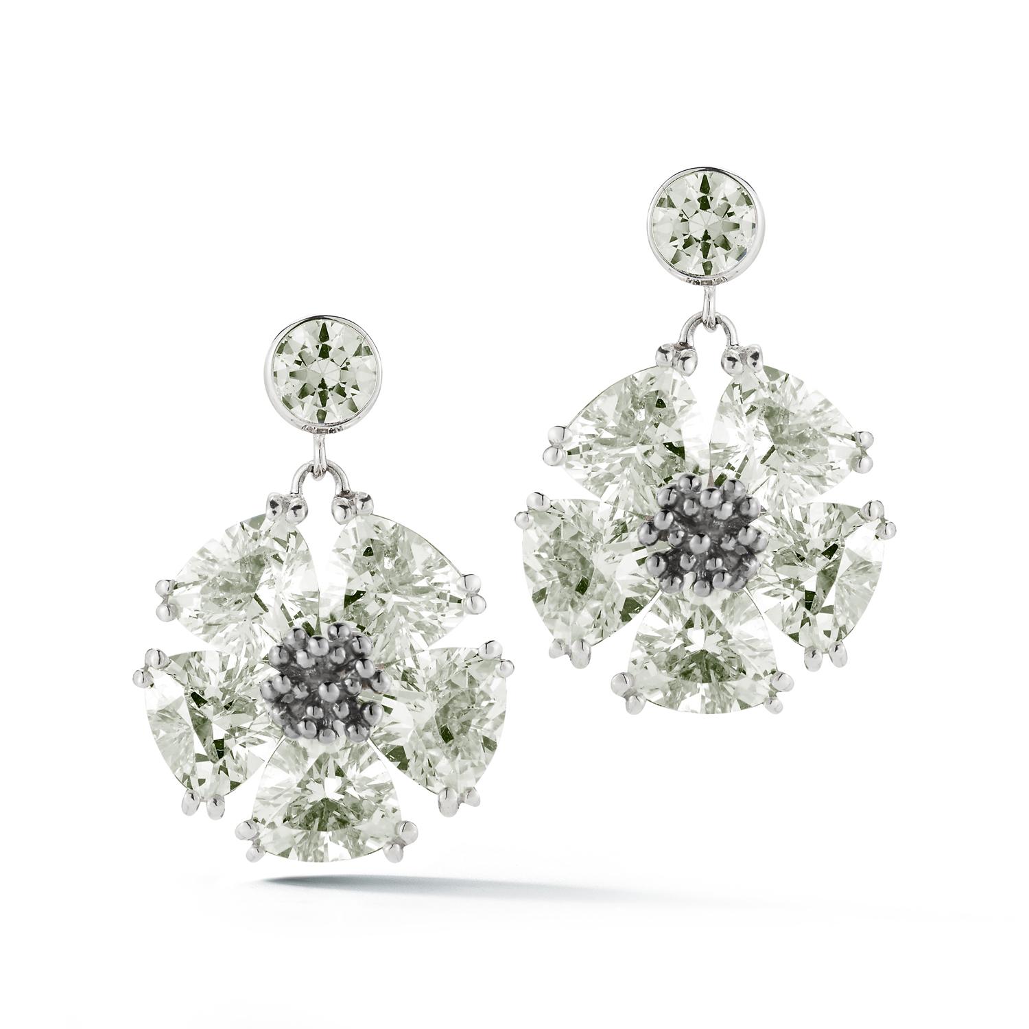 Designed in NYC

.925 Sterling Silver 12 x 7 mm White Sapphire Single Blossom Drop Earrings. The beauty of blossom blings with small stone top stud earring and dangling stone blossom in its full splendor! Single blossom stone drop earrings: