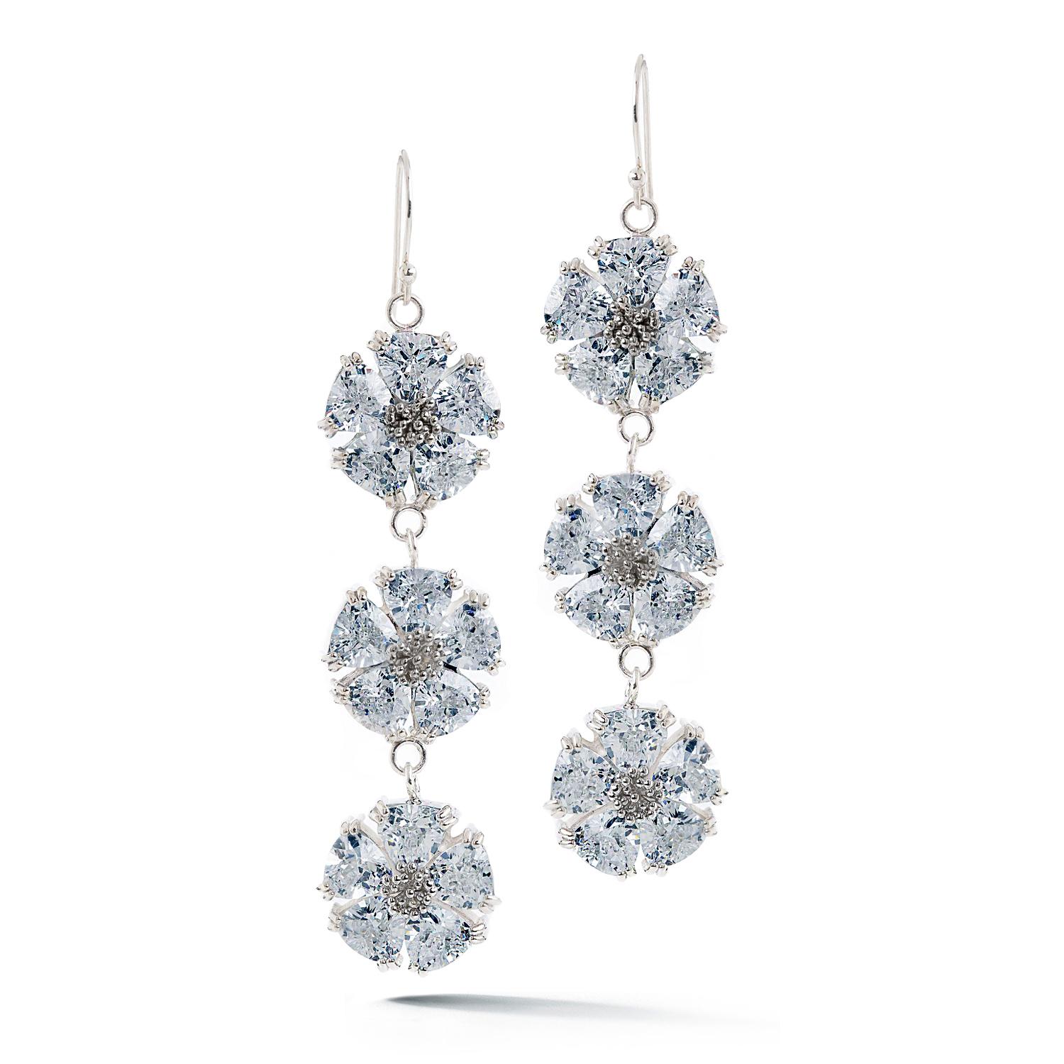 Designed in NYC

.925 Sterling Silver 30 x 7 mm White Sapphire Triple Blossom Stone Bling Earrings. No matter the season, allow natural beauty to surround you wherever you go. Triple blossom stone bling earrings: 

Sterling silver 
High-polish
