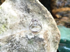 White Sapphire with Brown Diamond and Diamond Ring Set in 18 Karat White Gold