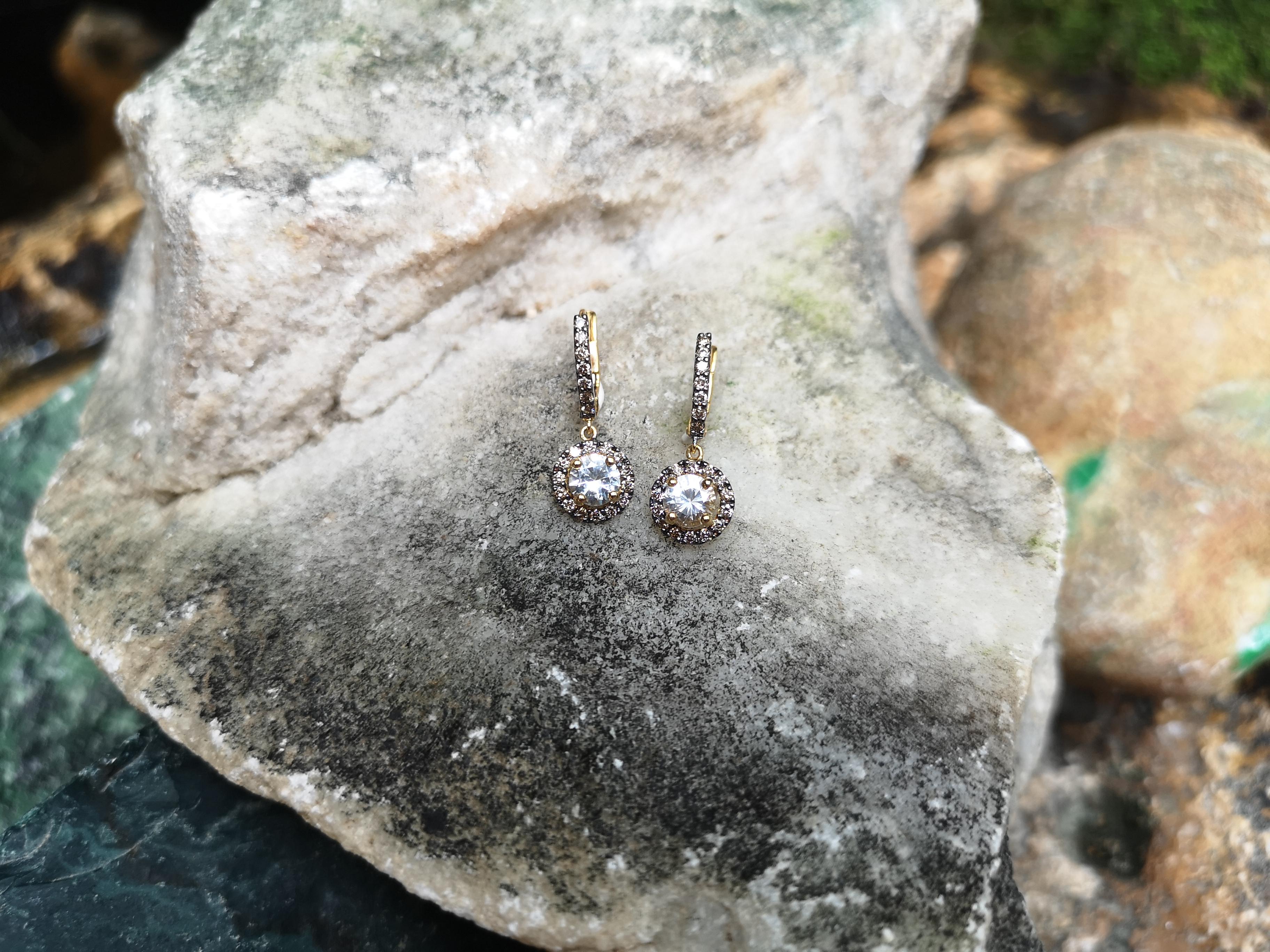 Round Cut White Sapphire with Brown Diamond Earrings Set in 18 Karat Gold Settings