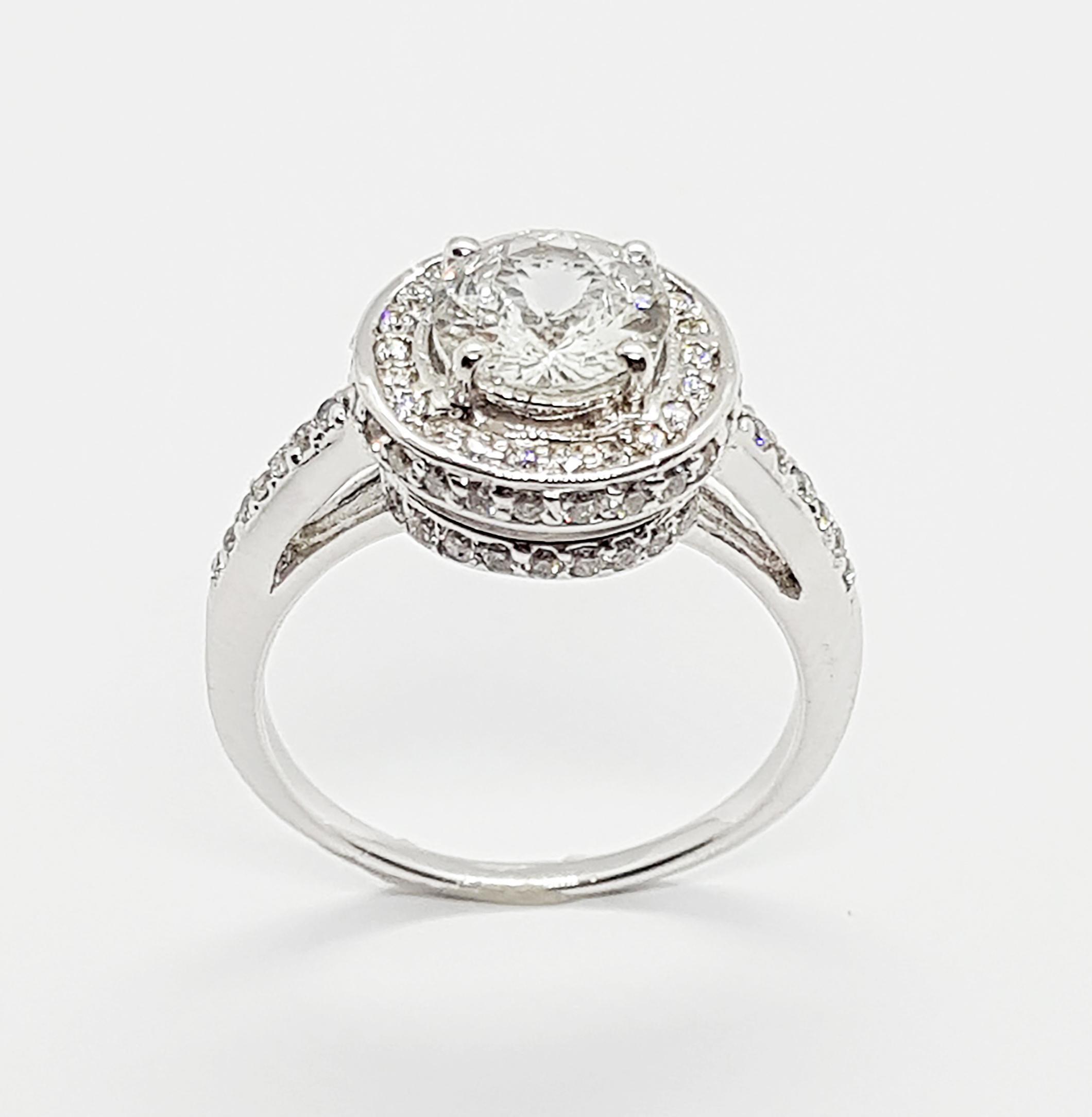 White Sapphire 1.36 carats with Diamond 0.51 carat Ring set in 18 Karat White Gold Settings

Width:  1.2 cm 
Length:  1.2 cm
Ring Size: 53
Total Weight: 5.37 grams

White Sapphire 
Width:  0.7 cm 
Length:  0.7 cm

