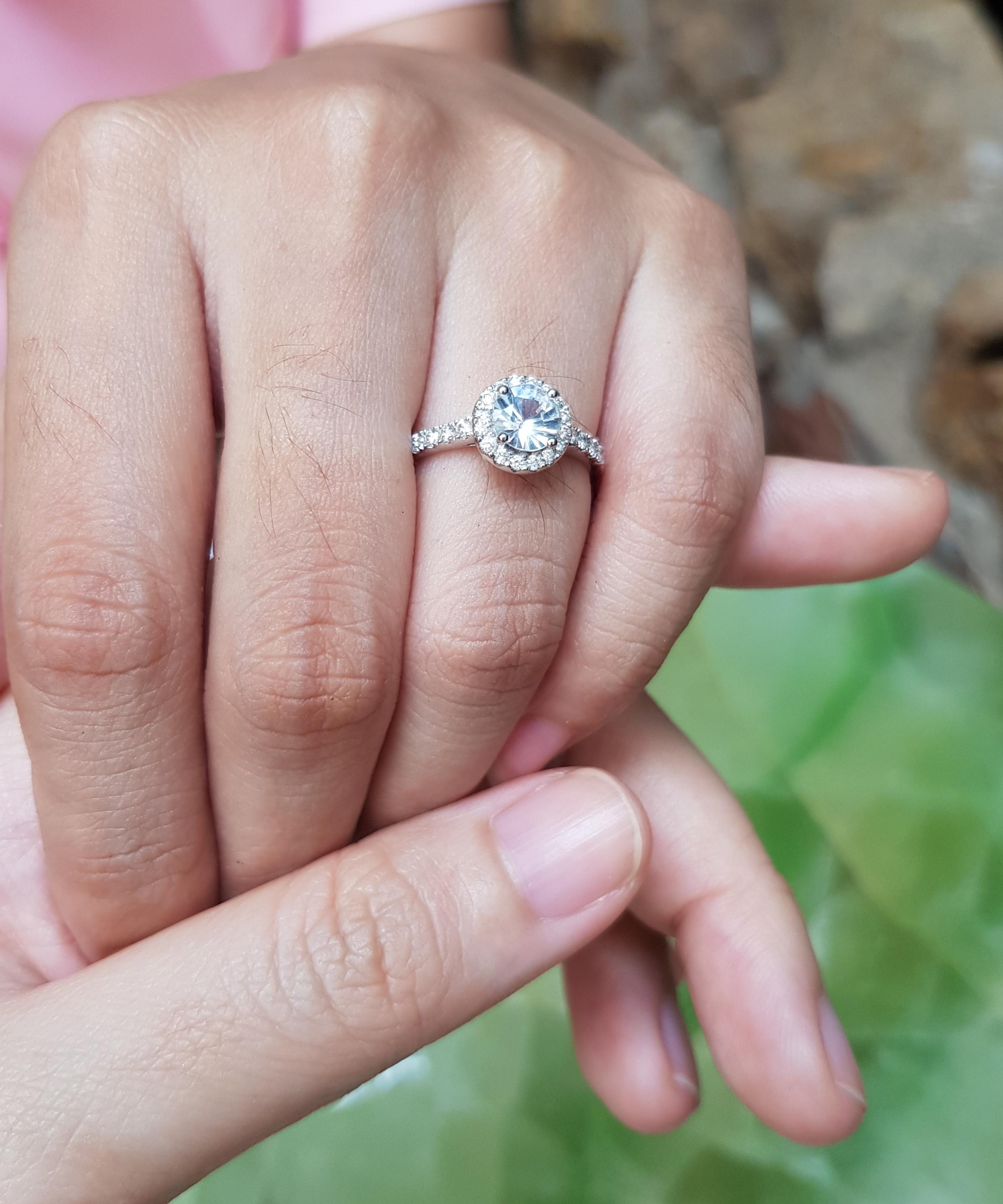 White Sapphire 0.94 carat with Diamond 0.26 carat Ring set in 18 Karat White Gold Settings

Width:  0.7 cm 
Length: 0.7 cm
Ring Size: 53
Total Weight: 4.14 grams

