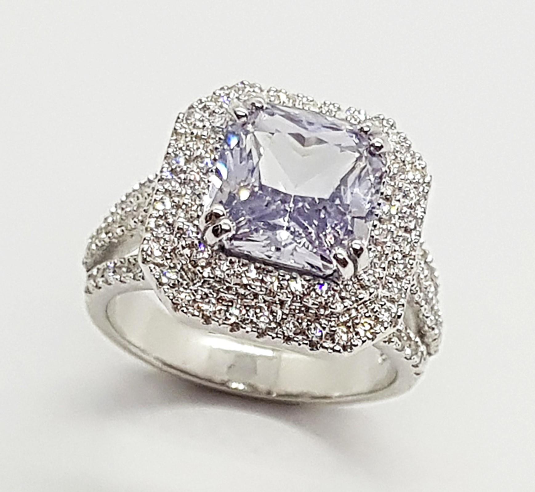 White Sapphire 4.36 carats with Diamond 0.88 carat Ring set in 18 Karat White Gold Settings

Width:  1.5 cm 
Length:  1.5 cm
Ring Size: 54
Total Weight: 9.92 grams

White Sapphire 
Width:  0.9 cm 
Length:  0.9 cm

