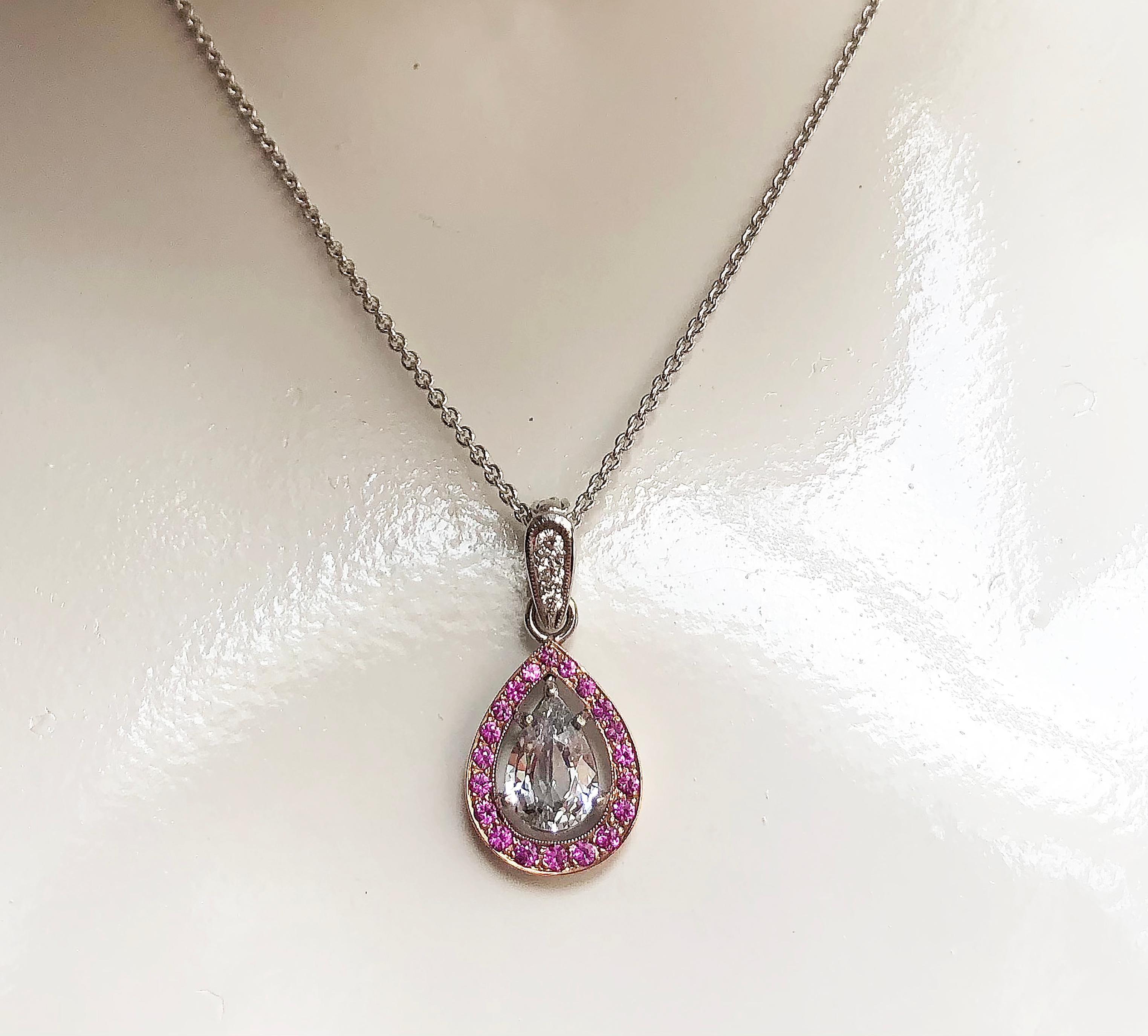 White Sapphire 1.58 carats with Pink Sapphire 0.40 carat and Diamond 0.07 carat Pendant set in 18 Karat White Gold Settings
(chain not included)

Width: 1.2 cm
Length: 2.6 cm 

