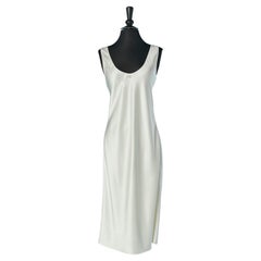 White satin sleeveless dress with rhinestone "CC" CHANEL