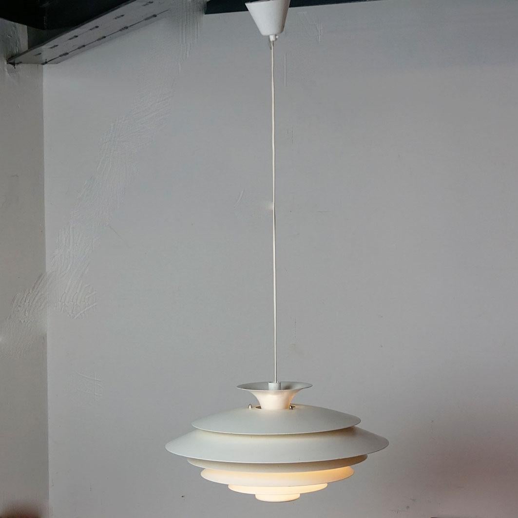 This beautyful white pendant lamp was produced in the 1980s in Denmark by Form Light , Mod. 52580 and its design is very close to lamps by Jo Hammerborg.
Form-Light lamps are in a class of their own, when it comes to use of Material and build