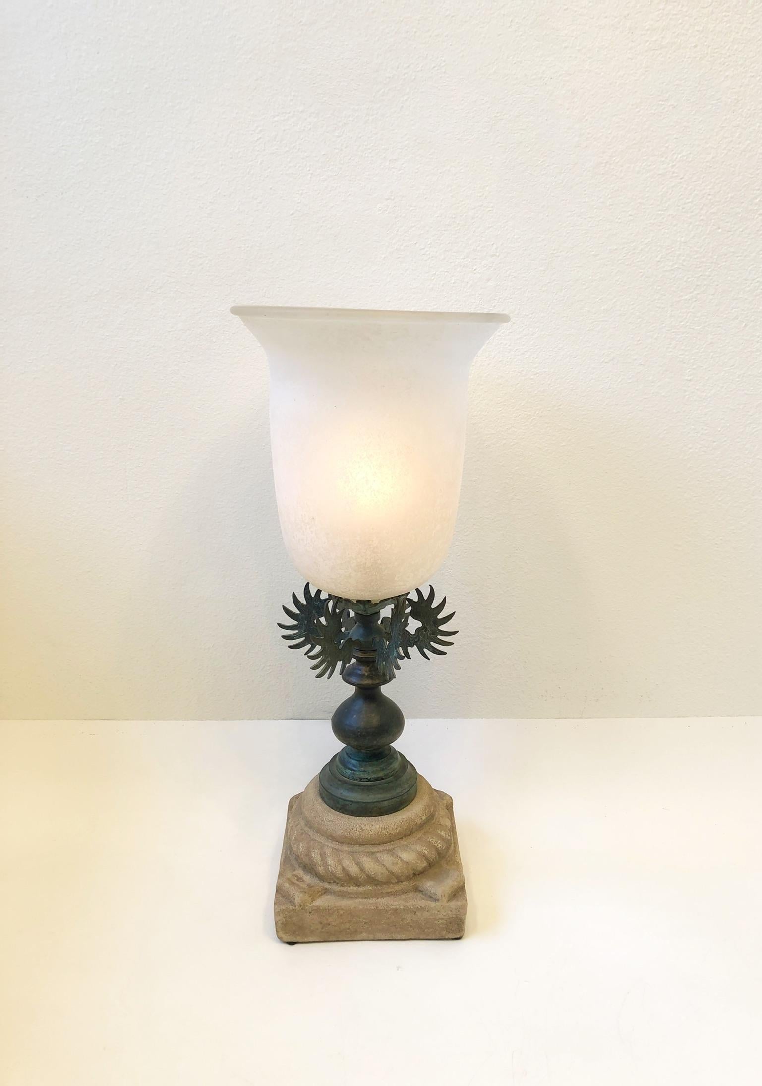 1980’s large white scavo Murano glass and bronze on a plaster base table lamp. 
It takes one small candelabra 75w max bulb. Newly rewired with inline dimmer.
Measurements: 30.63” high, 12.75” diameter 
Base- 9.75”wide, 9.75” deep.