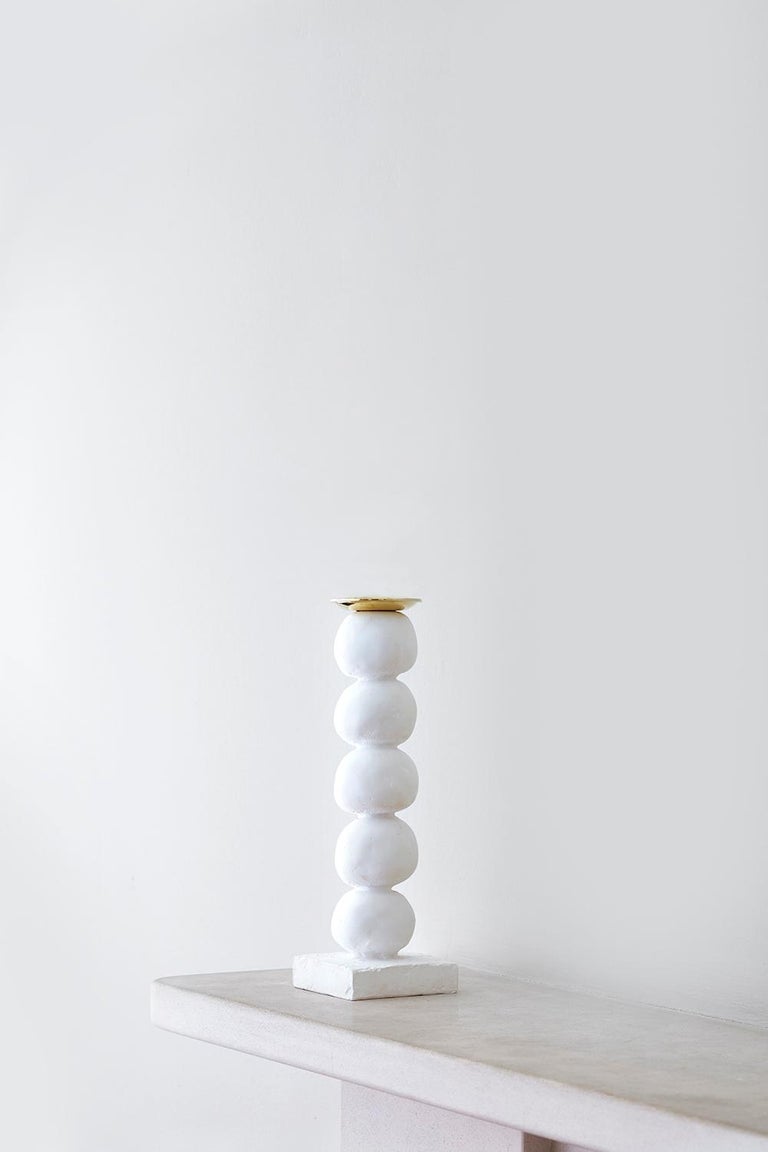 Margit Wittig has used her sculptural skills to create beautifully-crafted, well-proportioned candlesticks, which are compositions of her unique signature pearl-shaped designs.

Each candlestick begins as hand-sculpted spheres which are used to