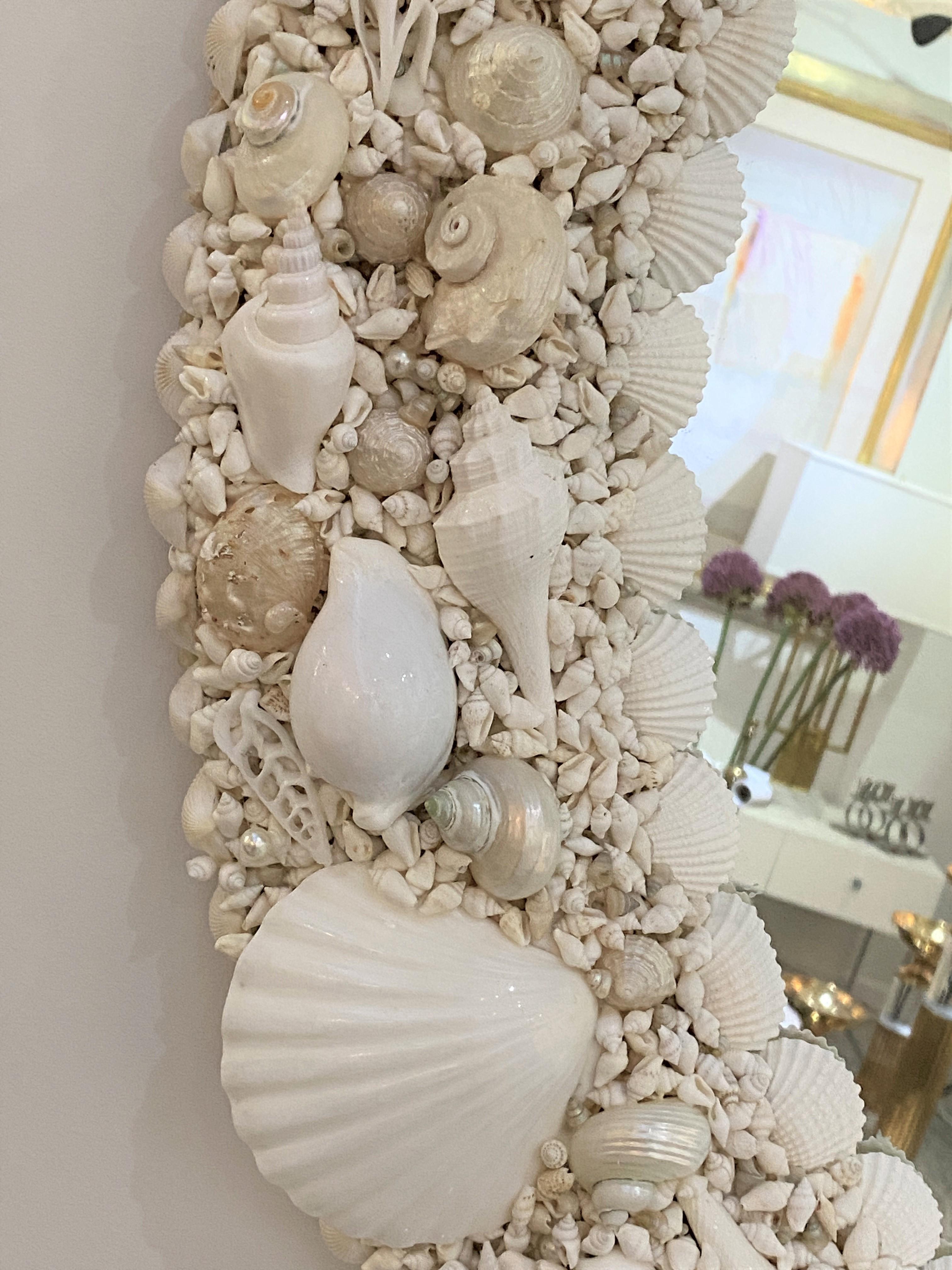 This stylish seashell encrusted mirror was created exclusively for the Iconic Snob Galeries by a local Palm Beach artist, and it will add that bit of Hollywood Regency style to your home and of course a bit of costal living.