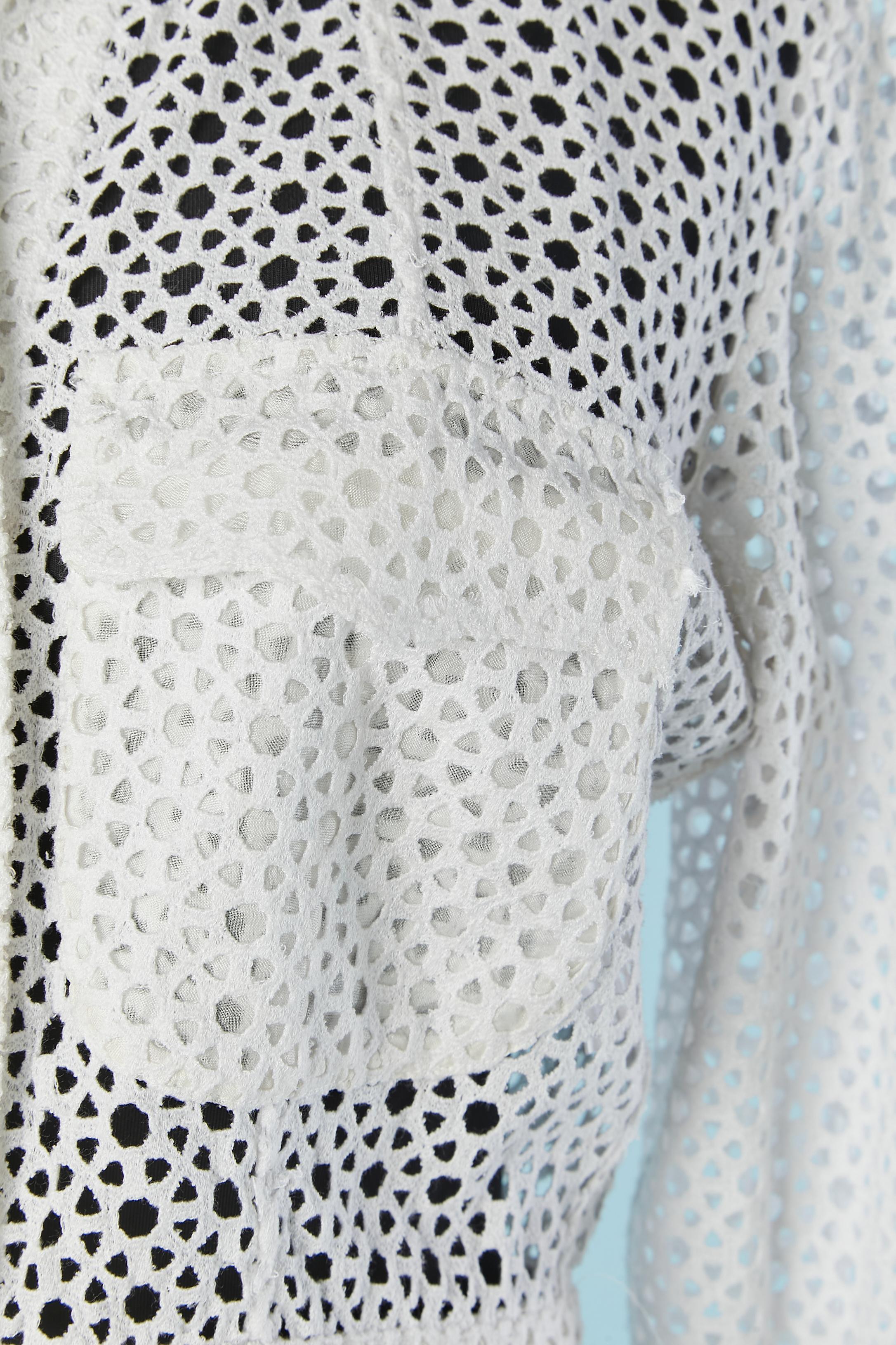 White see-through lace with rhinestone buttons closure on the middle front and cuffs.  Fabric composition: 100% polyester. Breast pocket on both side with lining. 
SIZE 40 (It) 36 (Fr) 6 (US) S 
