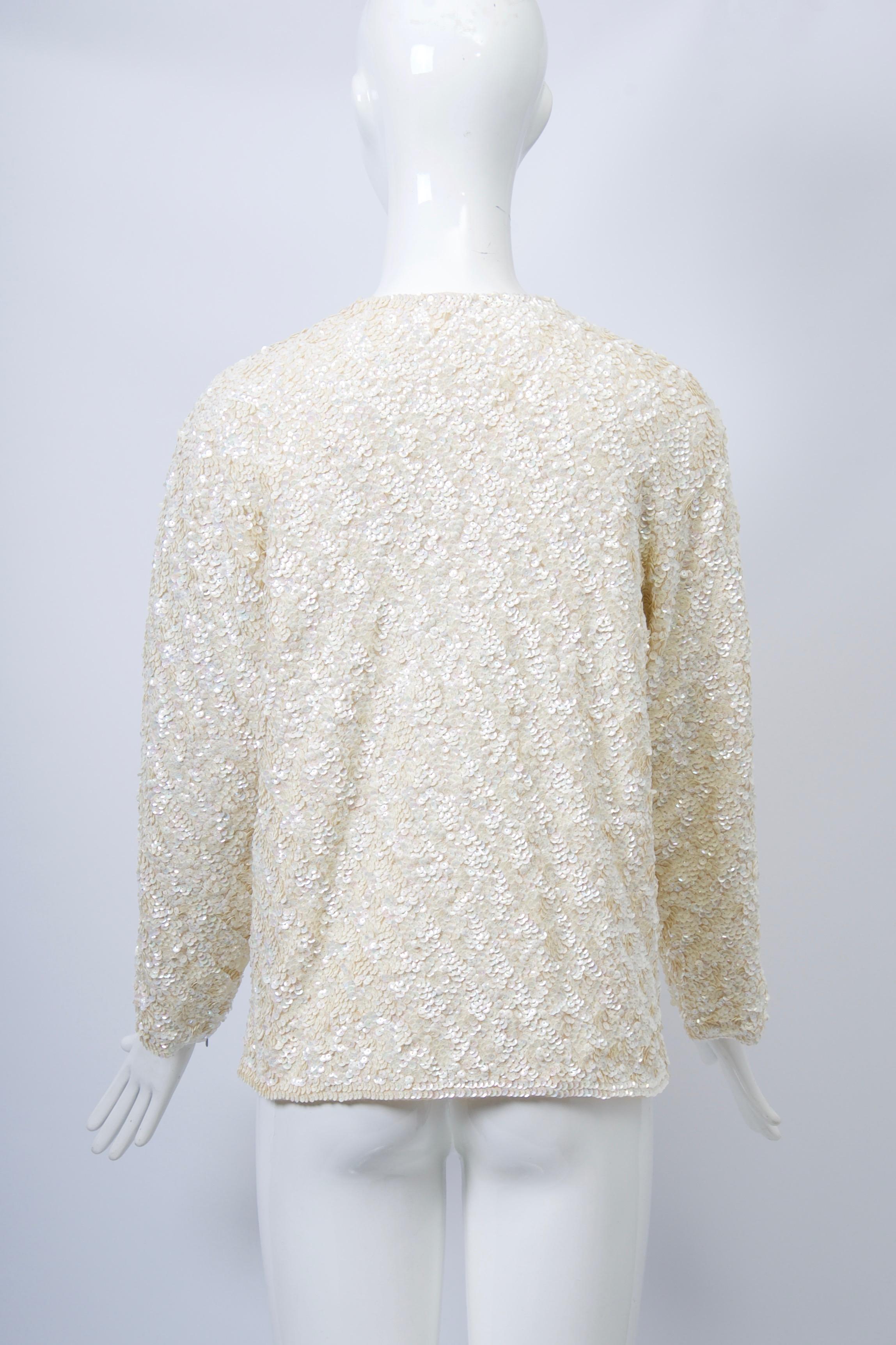white sparkly sweater