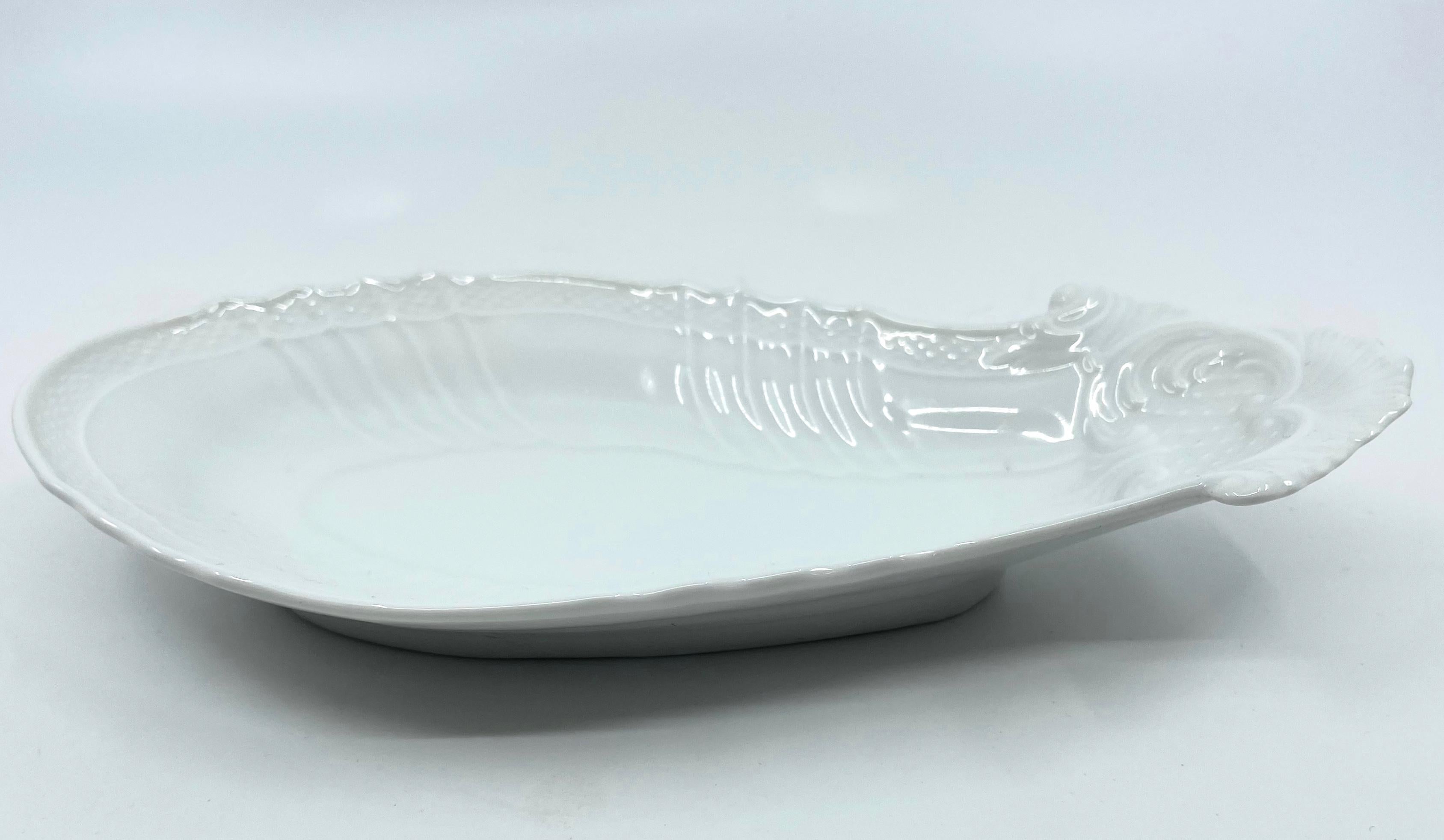 White shaped candy dish. Classic vintage Ginori Rococo paisley form shaped candy/serving dish. Italy mid-20th century. 
Dimensions: 9.5” W x 5” D x 2” H.